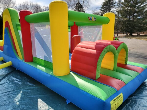 Rainbow Obstacle Course Front view IV Bounce house rental