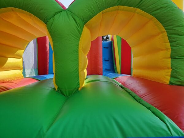 Rainbow Obstacle Course inside view III Bounce house rental