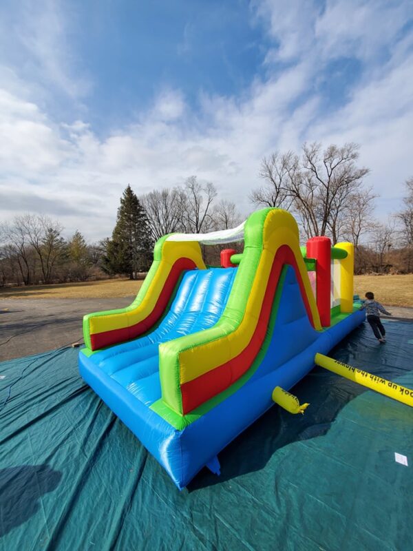 Rainbow Obstacle Course side view IV Bounce house rental