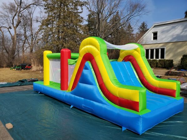 Rainbow Obstacle Course side view III Bounce house rental