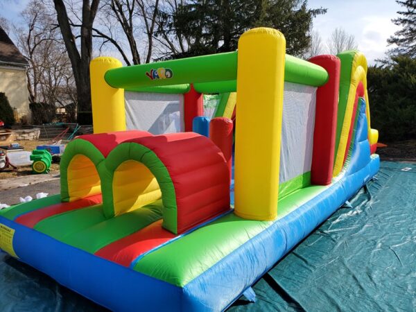 Rainbow Obstacle Course Front view I Bounce house rental