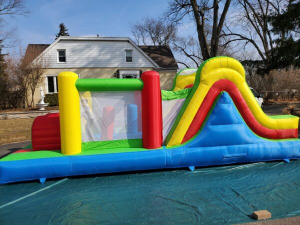 Rainbow Obstacle Course side view Bounce house rental